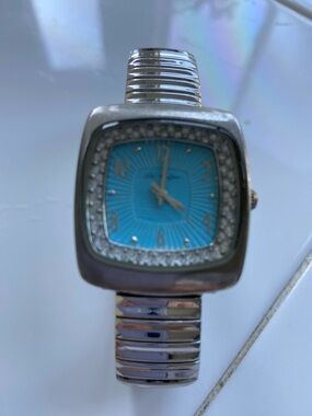 Women's Silver Stretch Bracelet Watch with Turquoise Dial